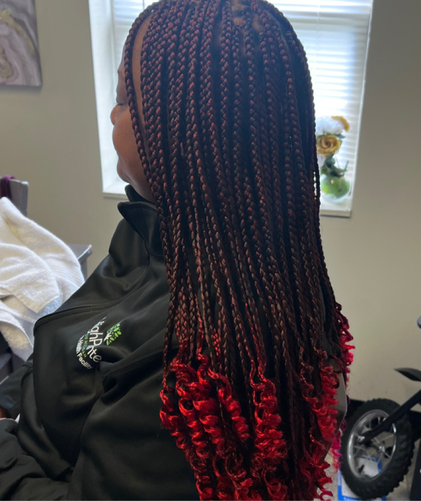 medium box braids at BraidedbyD in Buffalo, NY