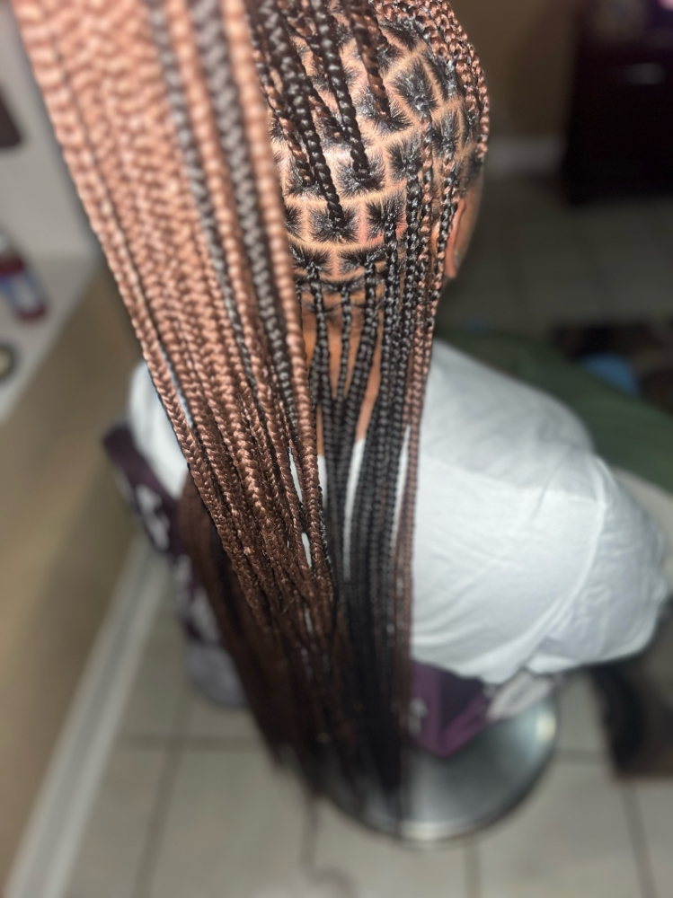 Box Braids/knotless-medium at Monaye’s in Lubbock, TX