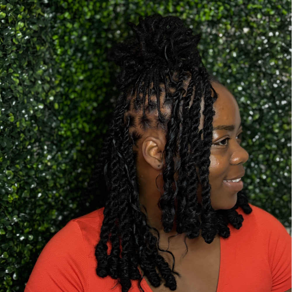 Retwist + Style with added hair at Loc’d by Kiona in Houston, TX