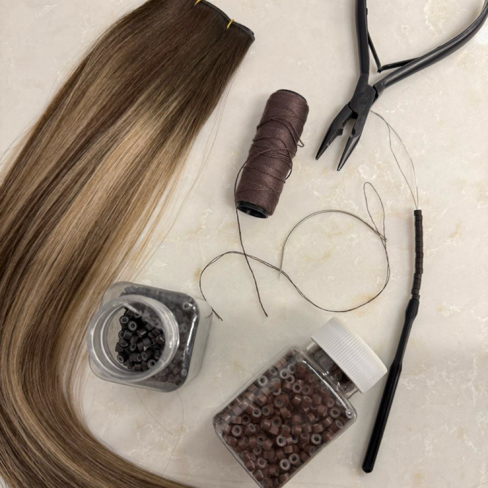 Weft extension maintenance at THE  BEAUTY LOUNGE X SAMANTHA in Dallas, TX