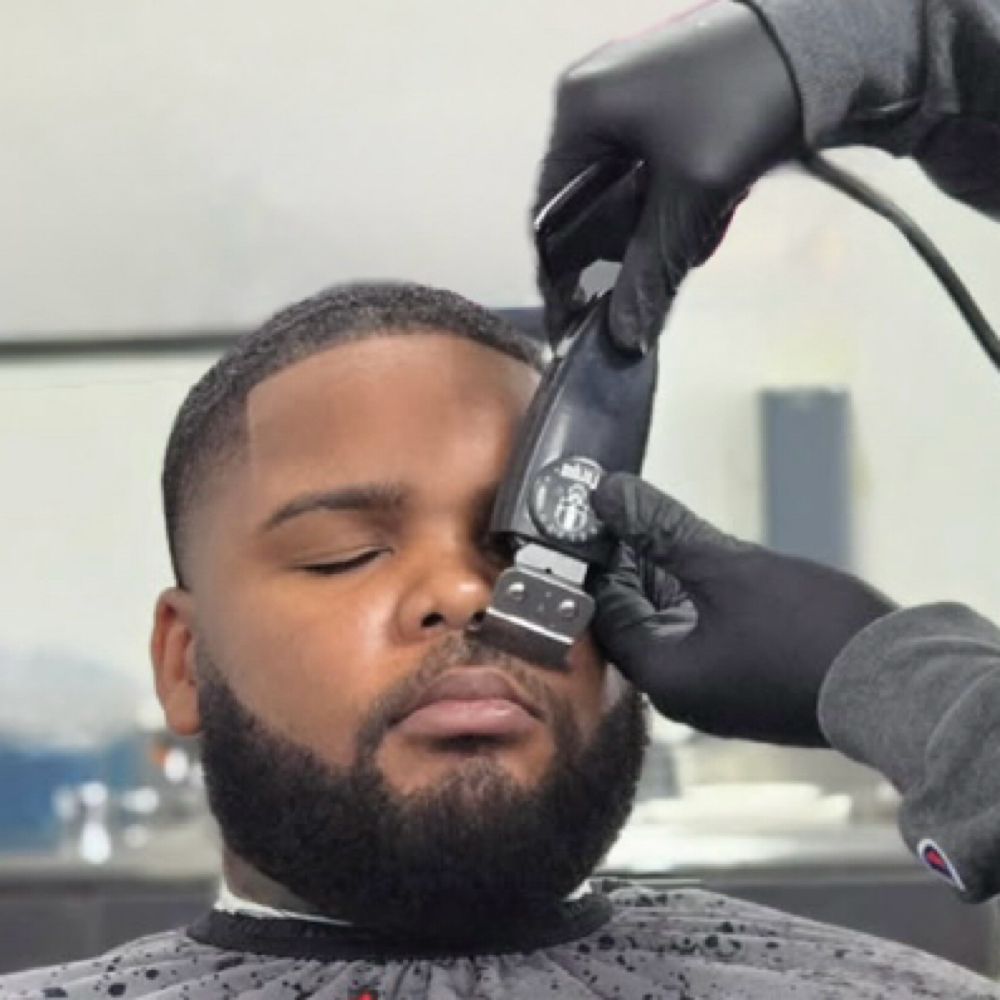 Premier Haircut (W/Facial Hair) at Dque The Barber in Sacramento, CA