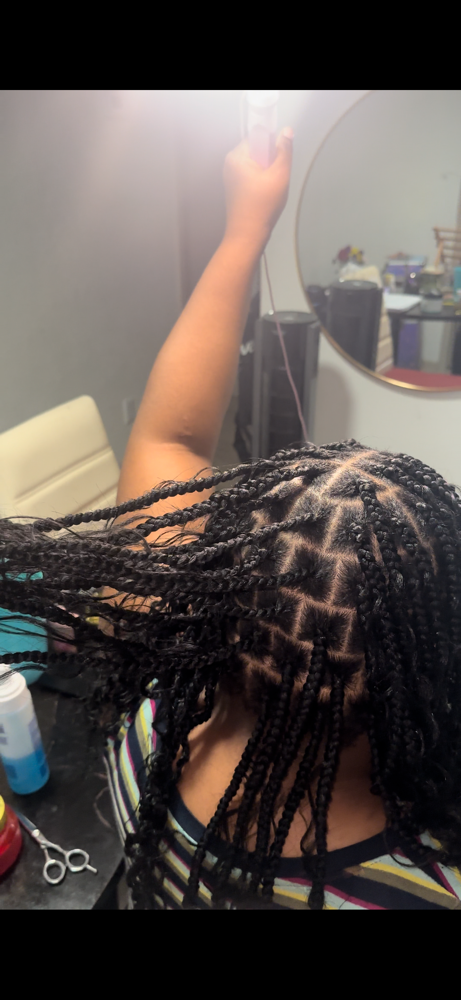 Knotless Braids at Oshi Wrote My Roots in Dallas, TX