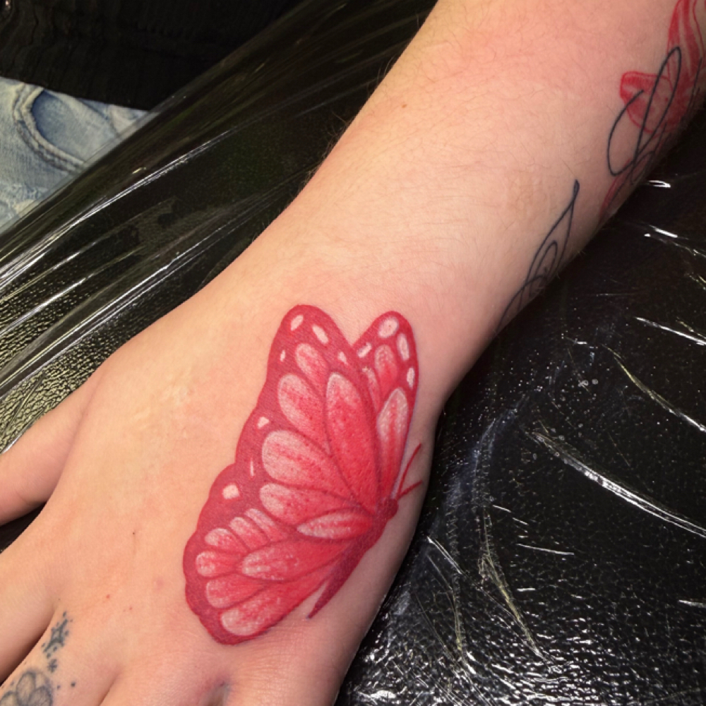 Hand Tattoo at Tattz by Kenzz in Texarkana, TX