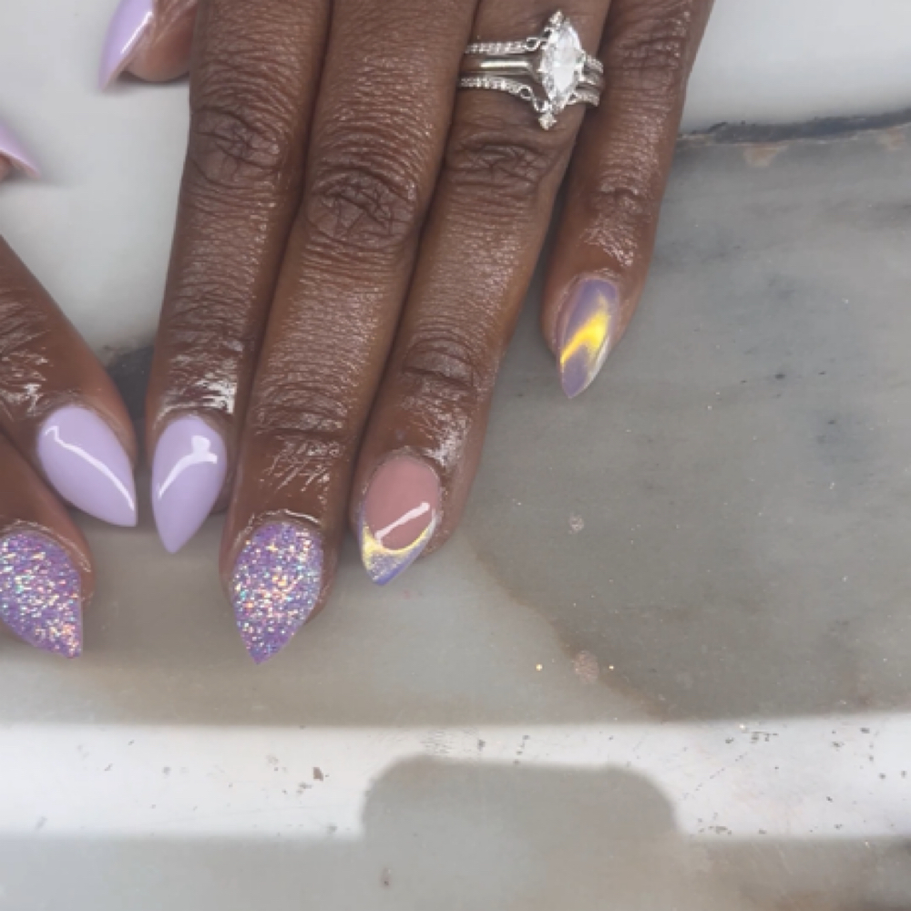 Fill in on short nails at Dolph's Nail Salon & Spa in Brandon, MS