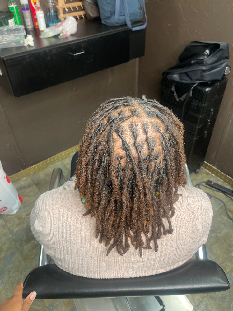 Traditional Retwist at Driashairstudio in Bedford, TX