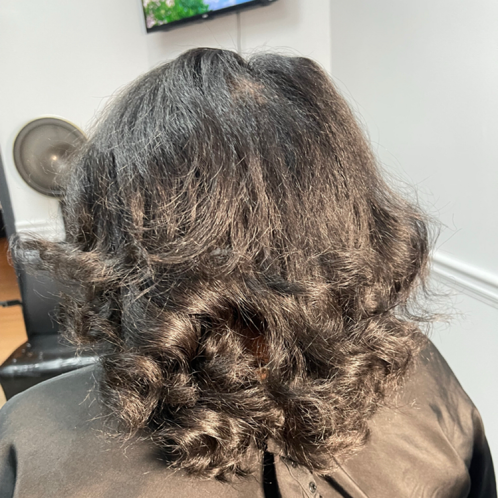 Blow out press at Naturally Glitz Beauty Salon & Boutique in Newnan, GA