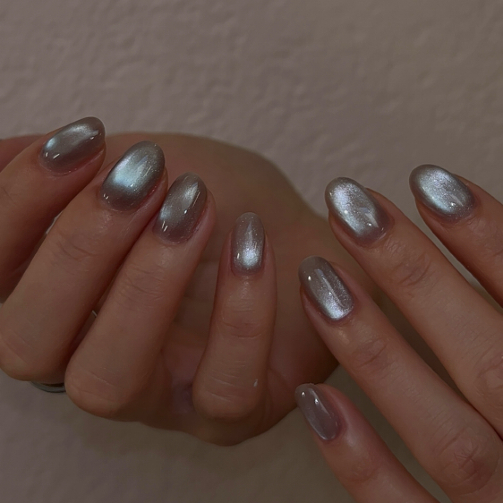 Glitter, chrome, cat eye (Stacy) at XiuXiu Nail Room in San Jose, CA