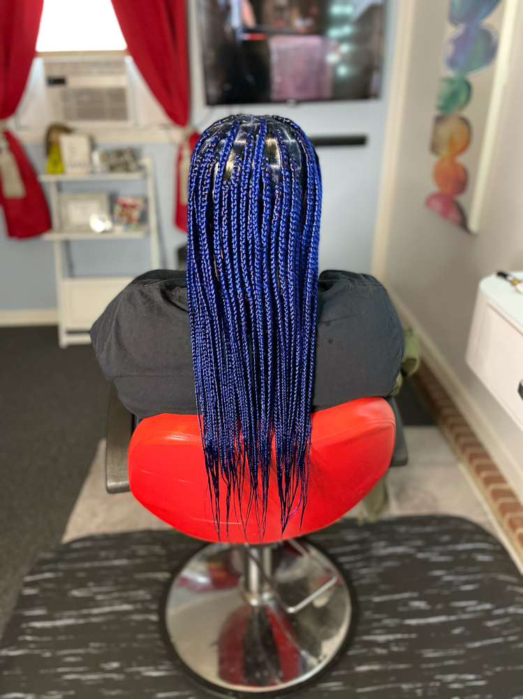 Medium Mid-back Knotless at Crowned Hair in Augusta, GA