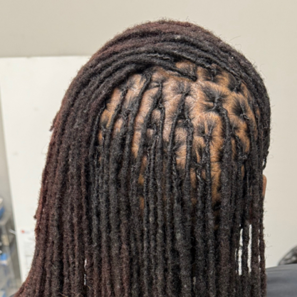 Consultation For Interlocking at Art of Locs By Locgod in Memphis, TN