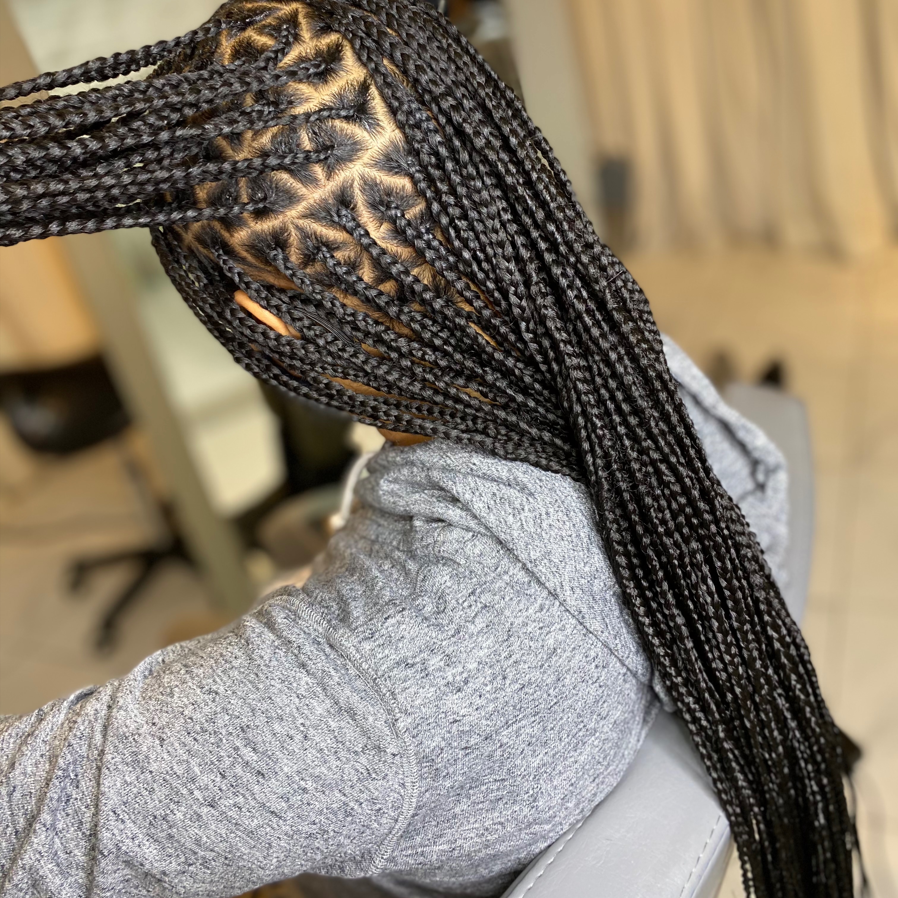 Small Box Braids at Headlines by Stephen in Selden, NY