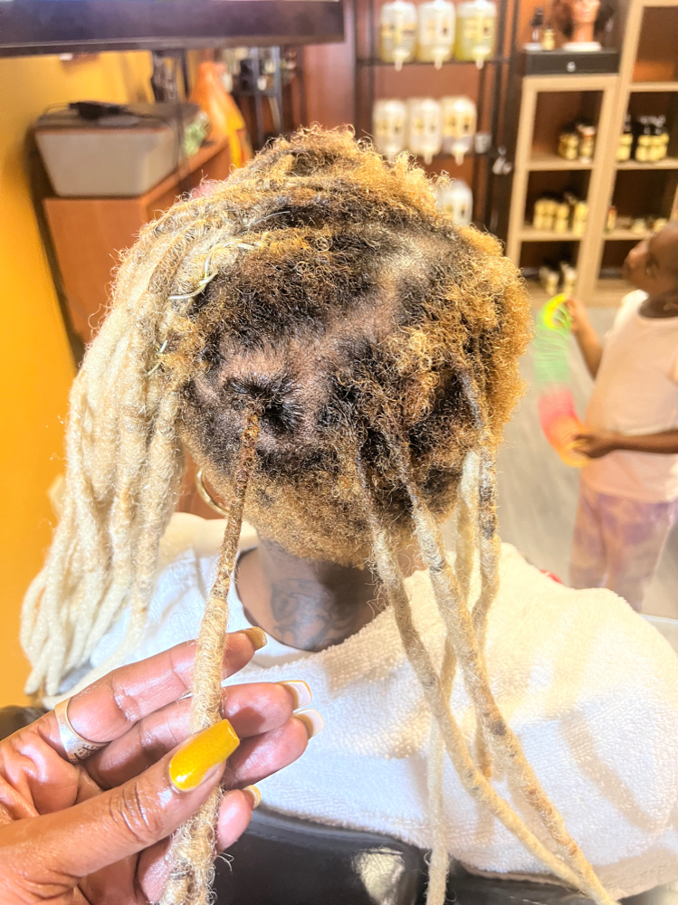 Loc Repairs at U N I FOR HAIR LLC in North Charleston, SC