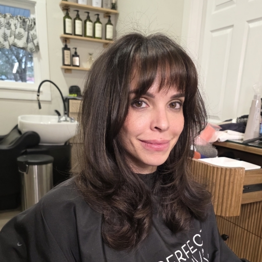 Bang trim at The Perfect Canvas Hair Salon in katy, TX