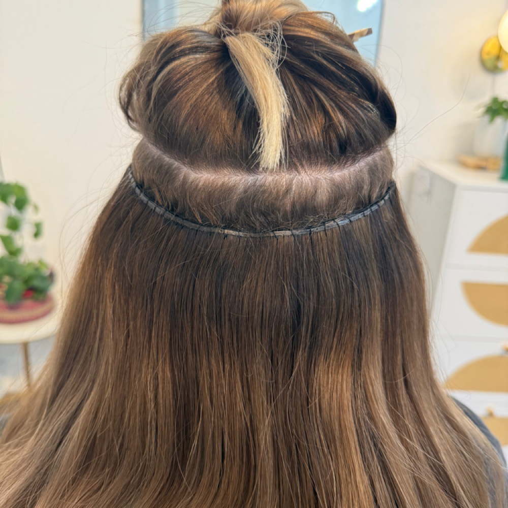 Weft Reinstall 2 Row at CoastalHair&CO in Tampa, FL