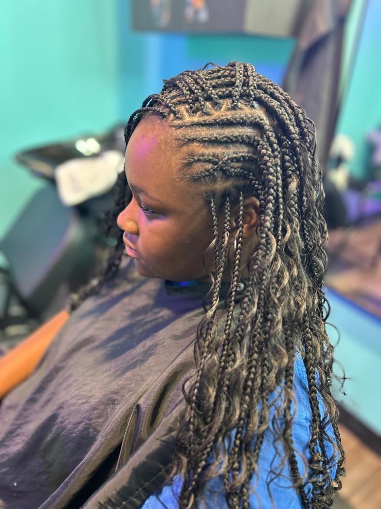 Fulani Knotless Braids at Thahairtherapist in Houston, TX