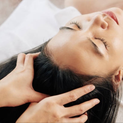 Scalp treatment massage at Blossoms HTX Hair Studio in Spring, TX