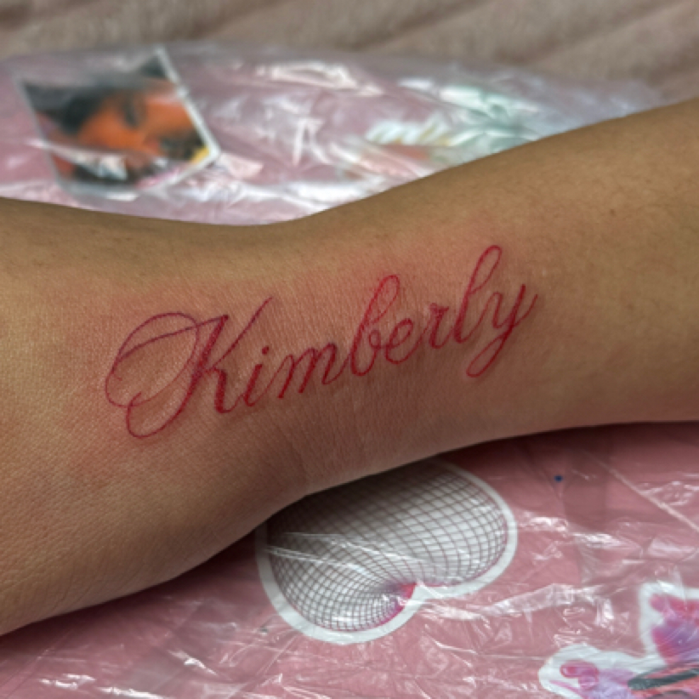 Red Script Fineline Tattoo at Jes P Beauty in Joliet, IL