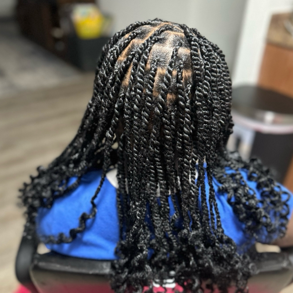 Medium Twist With Weave at braidedbyniya in fayetteville, NC