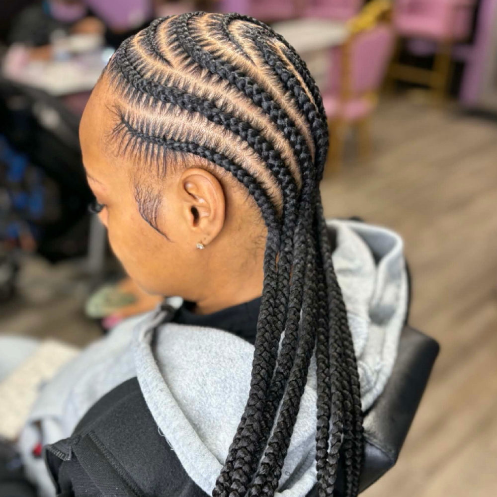 Precision Stitch Braids at The Hustlers Palace Salon in Whitehall, OH