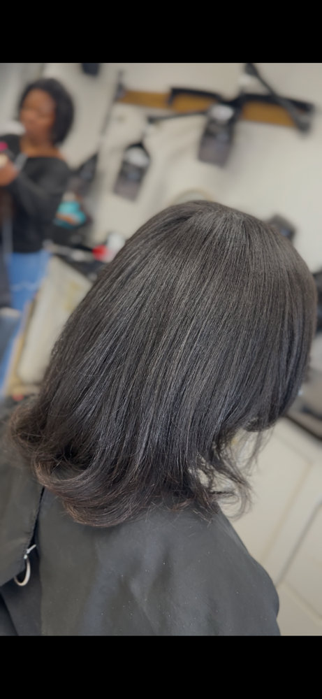 Luxurious Silk Press at Crowned by Marie LLC in Douglasville, GA