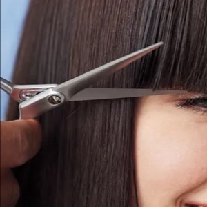 Bang Trim at Hair by Kristen McGraw in El Grenada, CA