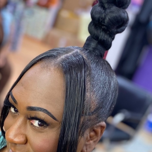 Top Knot Bun at BeYoutiful Beauty Barr in Houston, TX