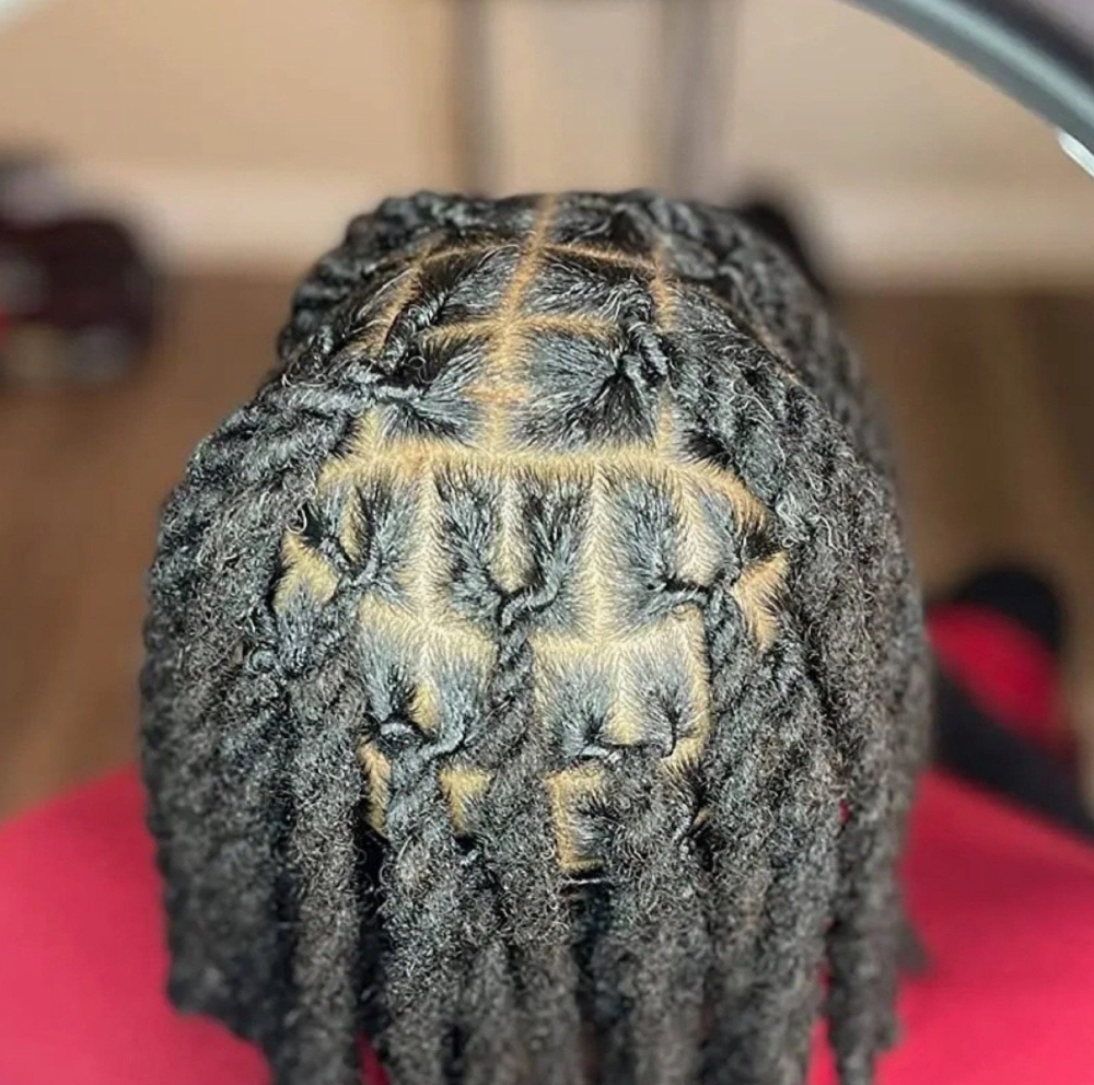 Re-twist Dread Loc at Flax Locks Studio Spa,LLC in Greenacres, FL