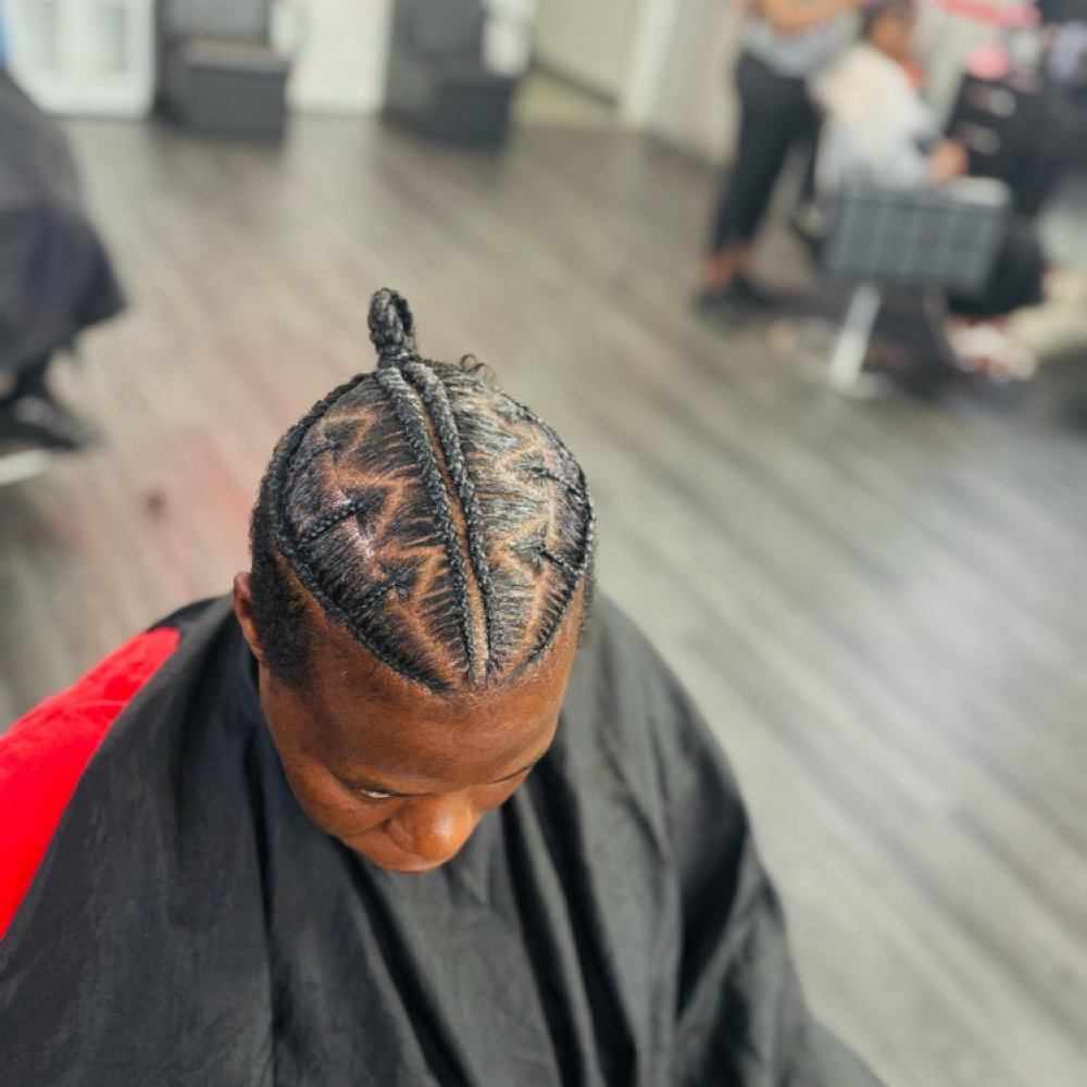 Men braids hairstyle at Alizah’s Hair Salon in Indianapolis, IN