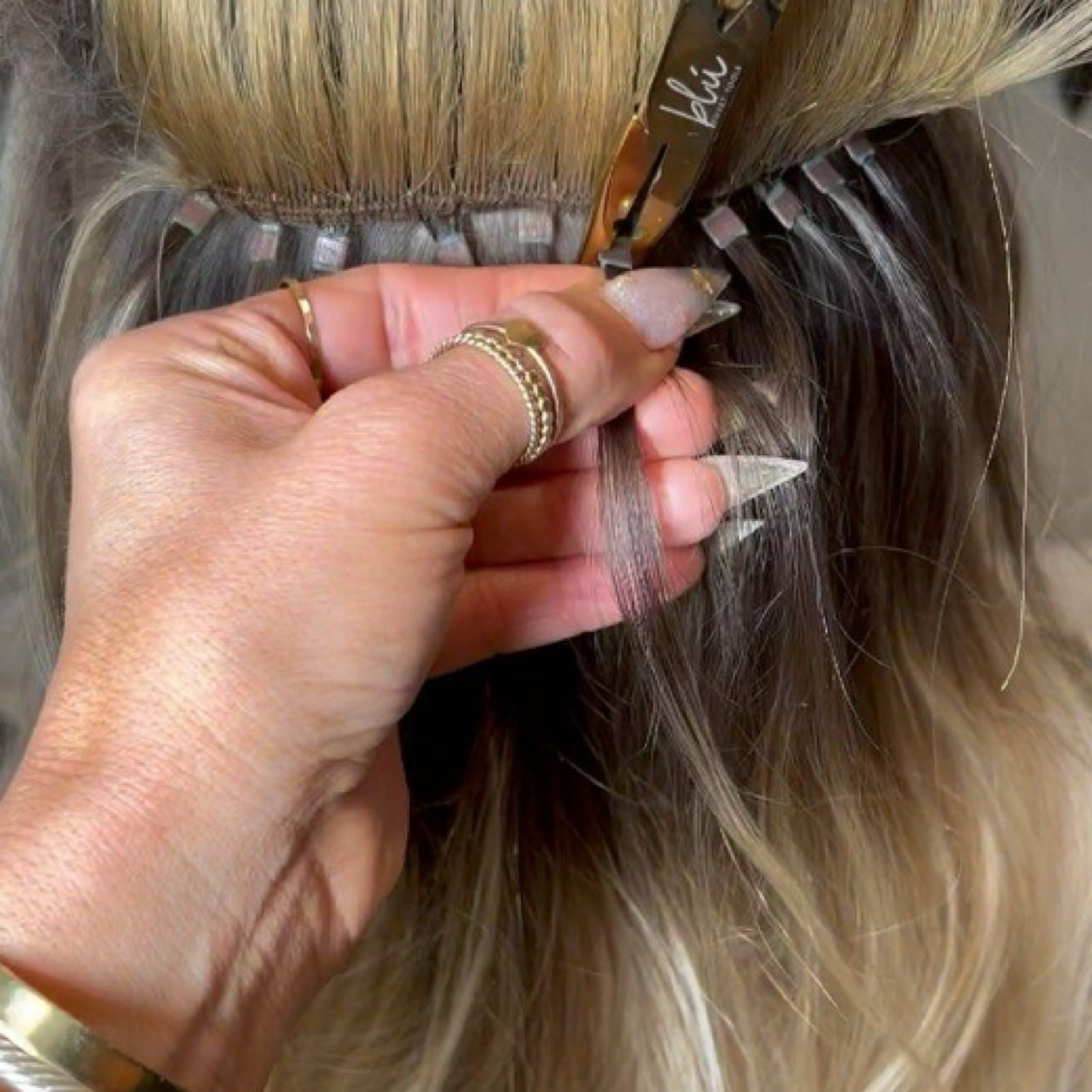 Hair extention move up at Crown Jewel Salon & Co. in Knoxville, TN