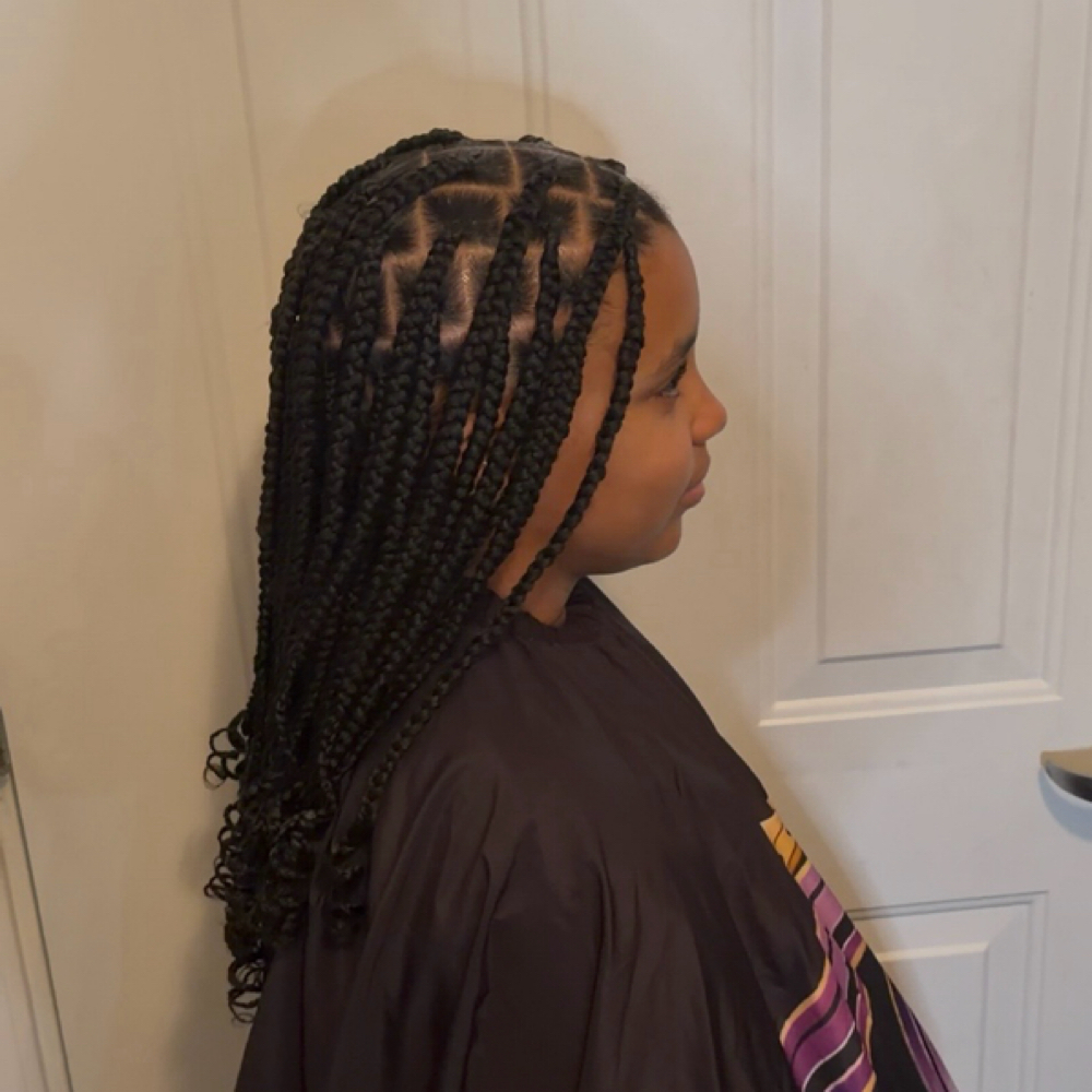 Kid Medium Knotless at TriumphStrands in GARDEN CITY, NY