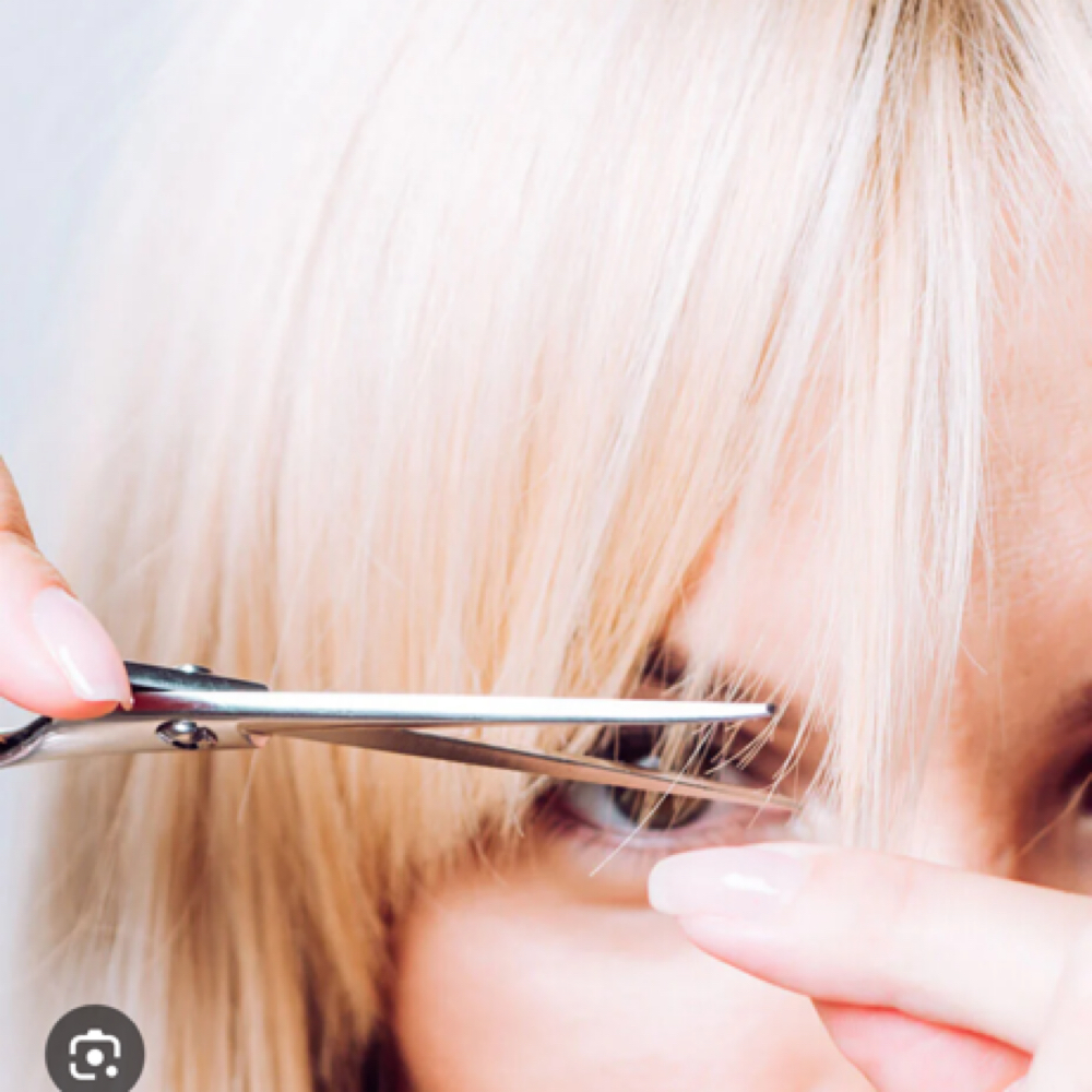 Bang Trim at Tangles Salon LLC in North Providence, RI