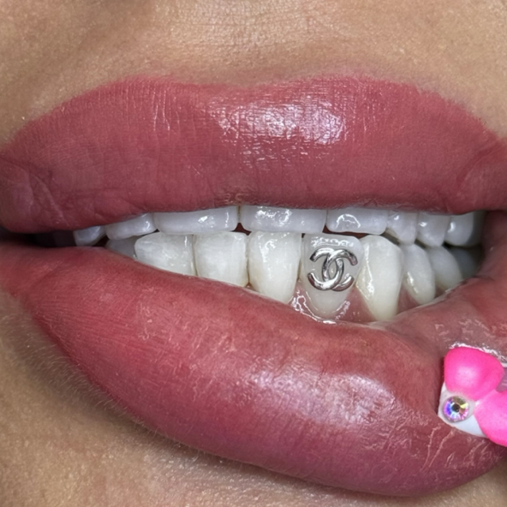 18k Gold Designer Gem at Queen Of The Mouth in San Antonio, TX