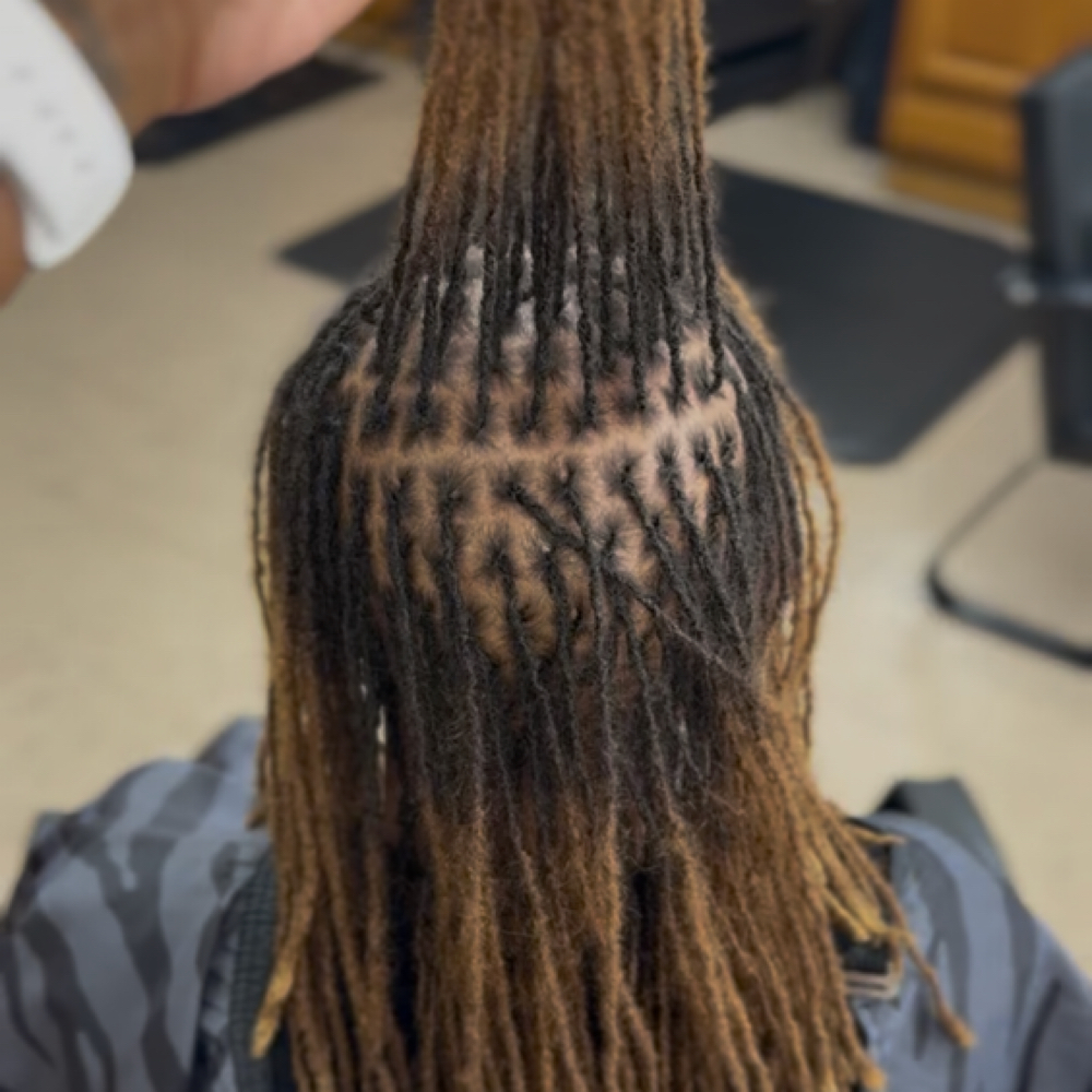 Traditional Locs Interlock at J. Marie’s Collection in Memphis, TN