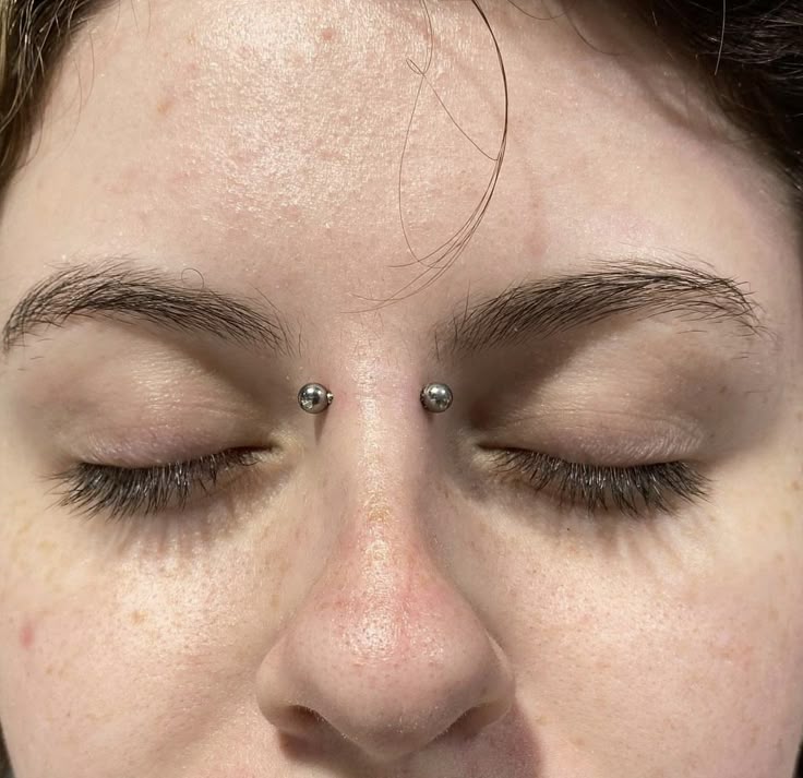 Nose Bridge Piercing