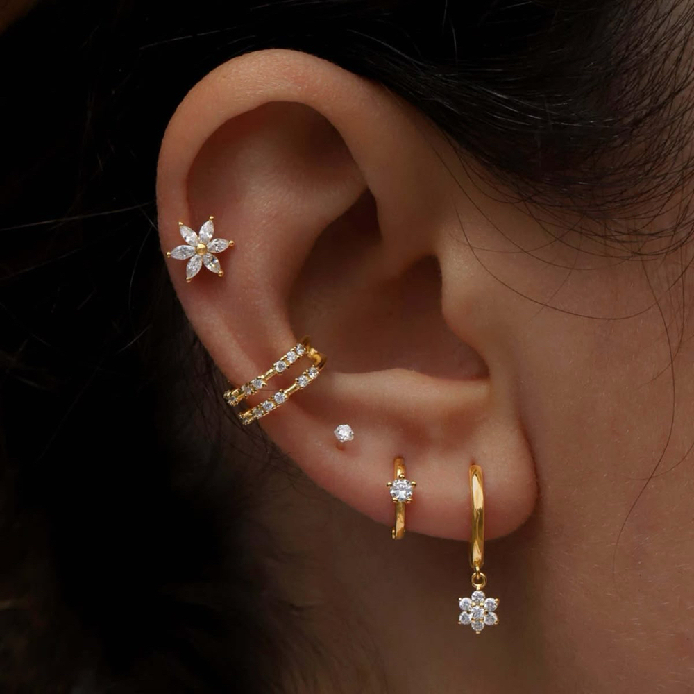 2 Piercings  and Ear Curration at Esthetically  Beautiful in Tracy, CA