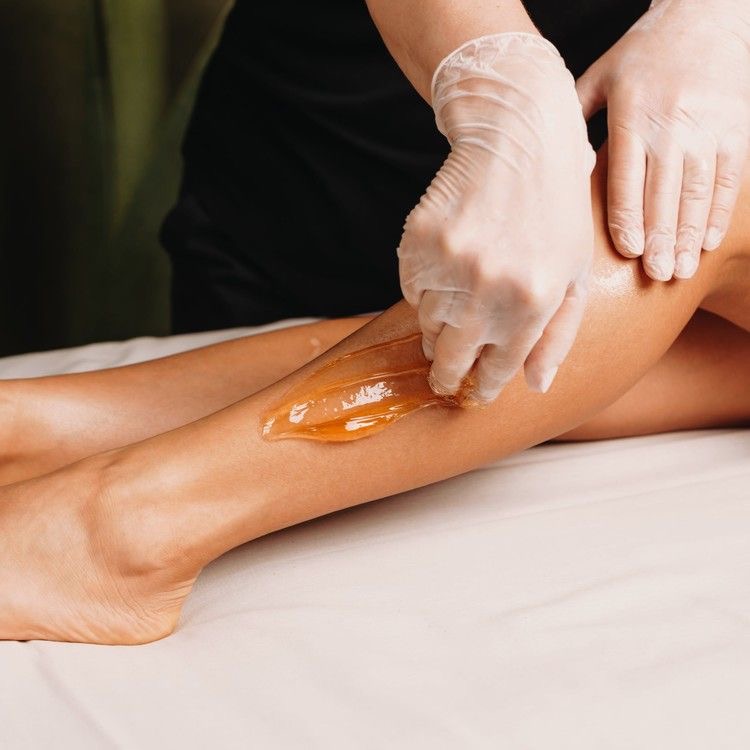 Woman’s Half Leg Sugaring