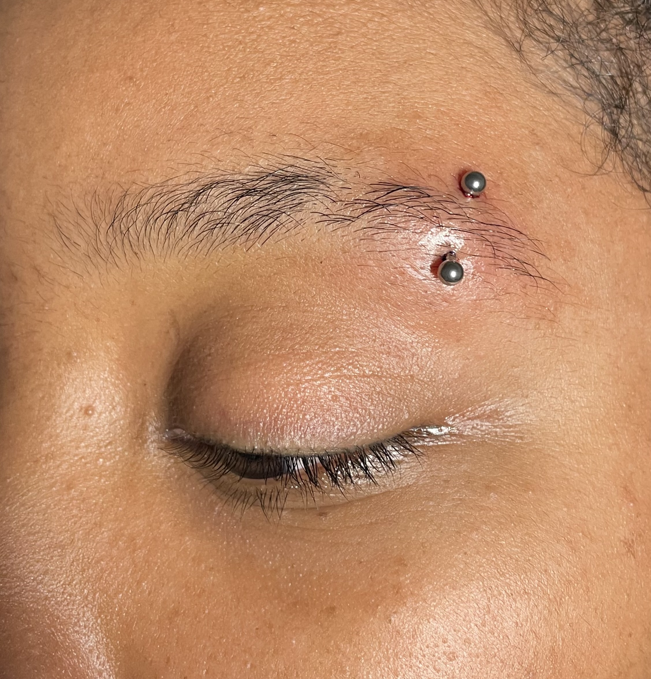 Eyebrow piercing