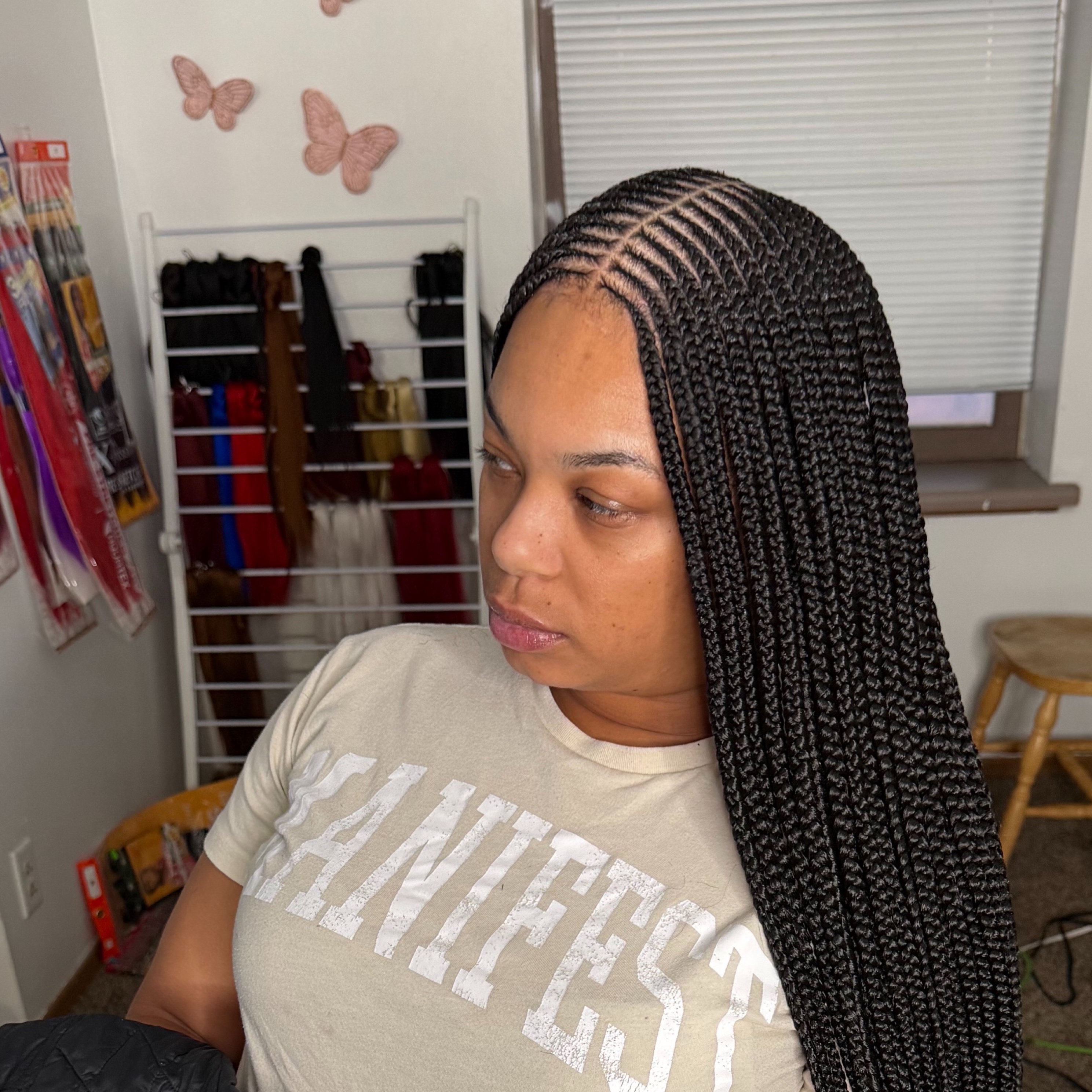 Middle Part Medium Tribals Braids. at Braidsby Laziria in Milwaukee, WI