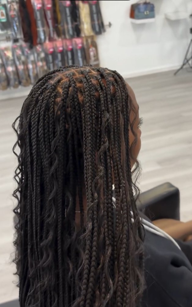 FEW CURLS OUT OF BRAIDS