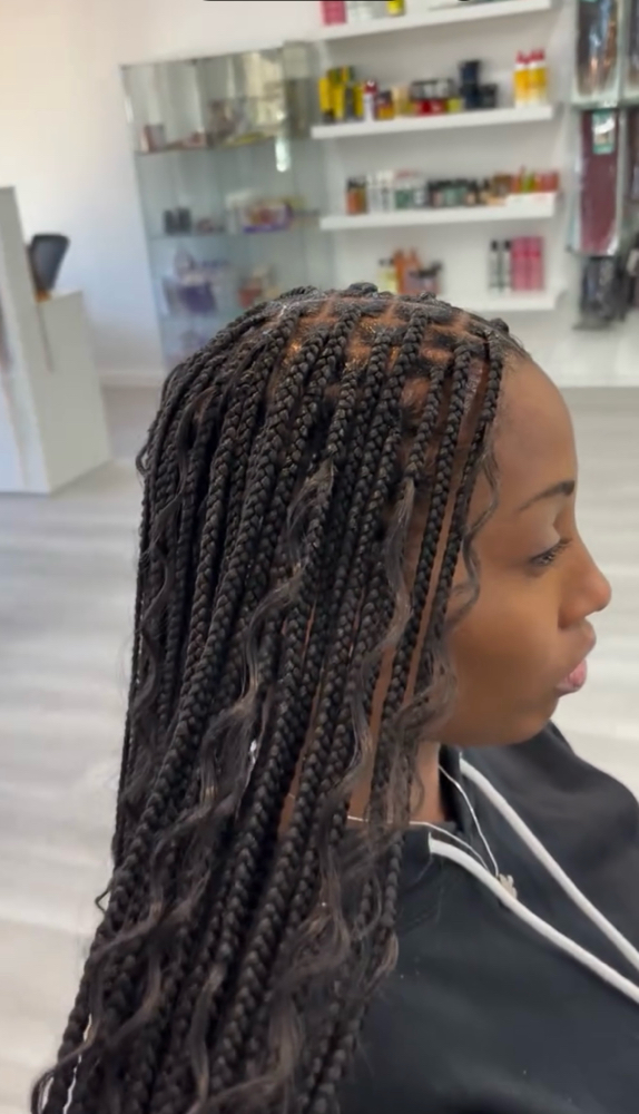FEW CURLS OUT OF BRAIDS