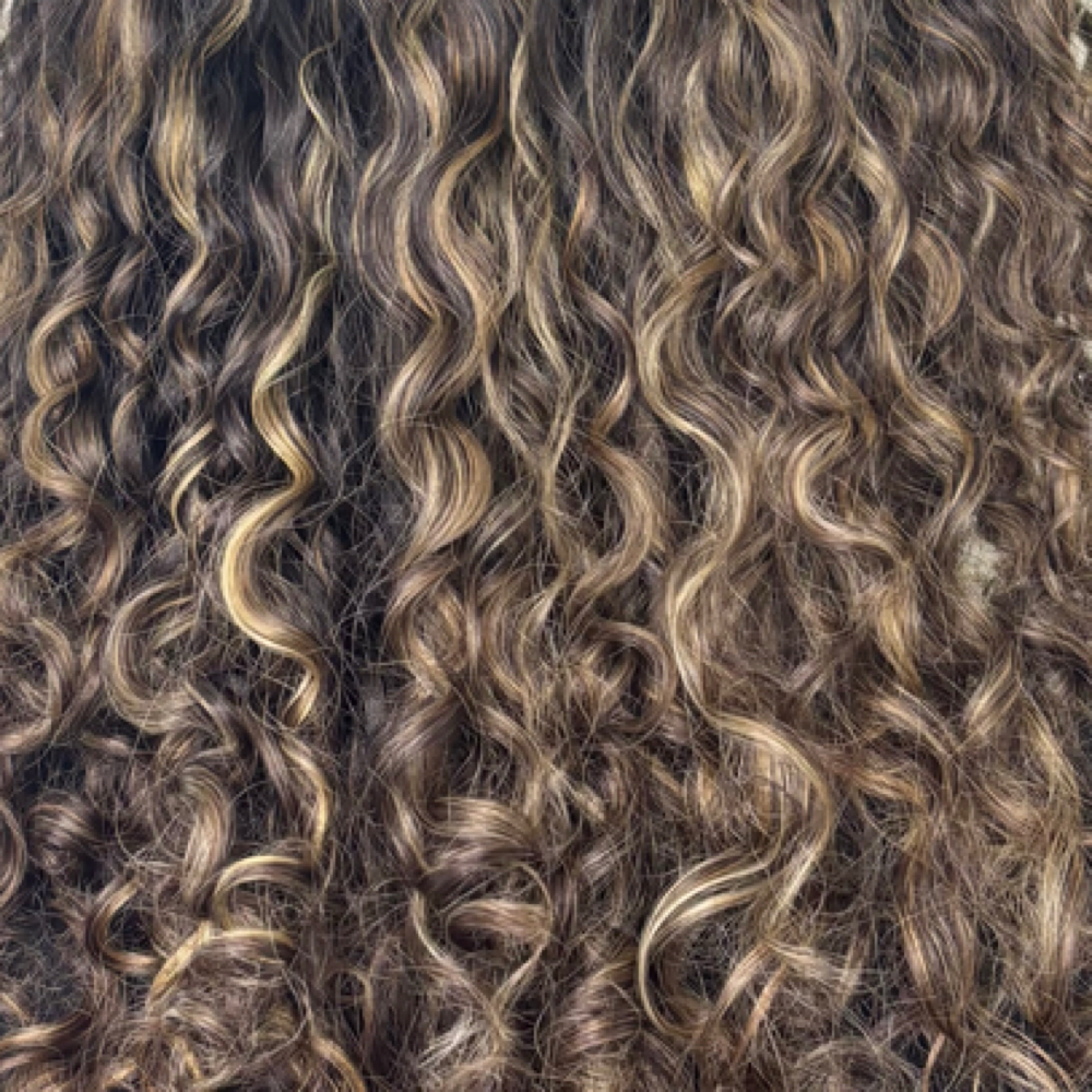 Custom Curl Cut at Emily Thornton in Jacksonville, FL