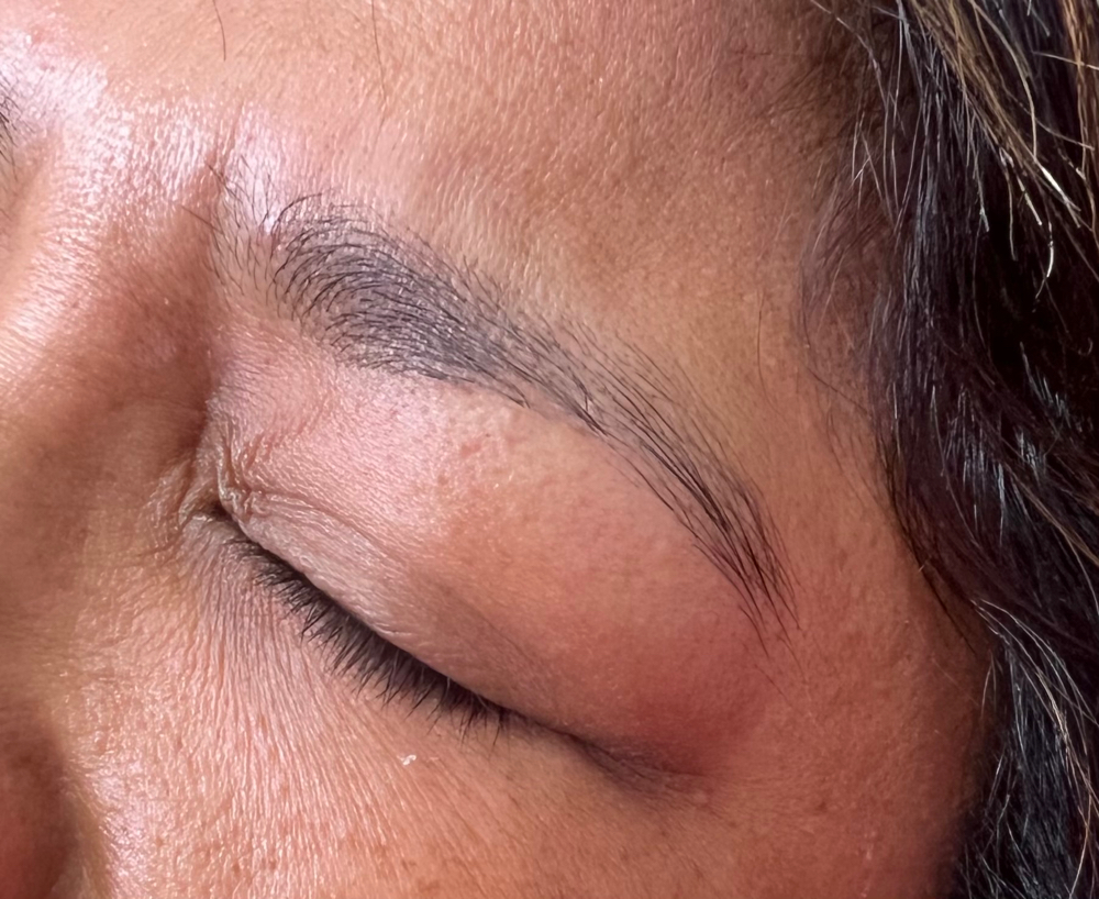Brow tweezing