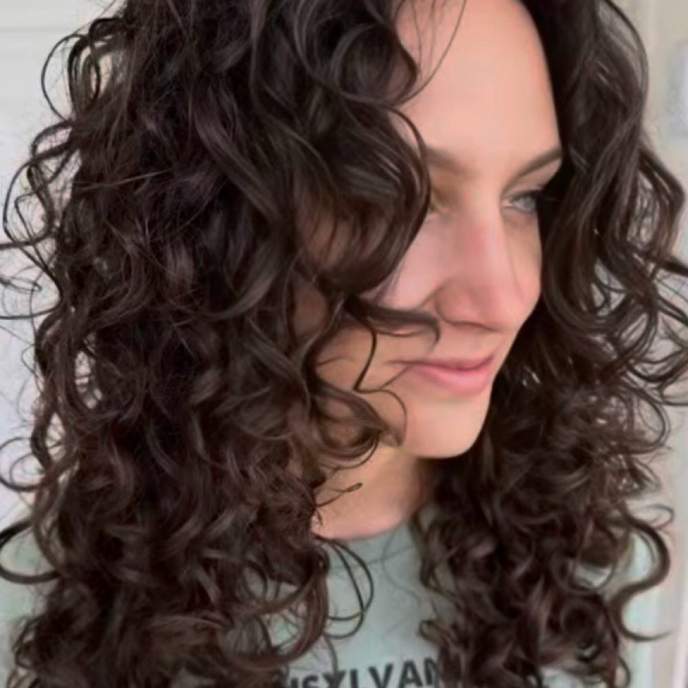 Curl cut with wash and dry at Hairapy 133 in Pleasant Unity, PA