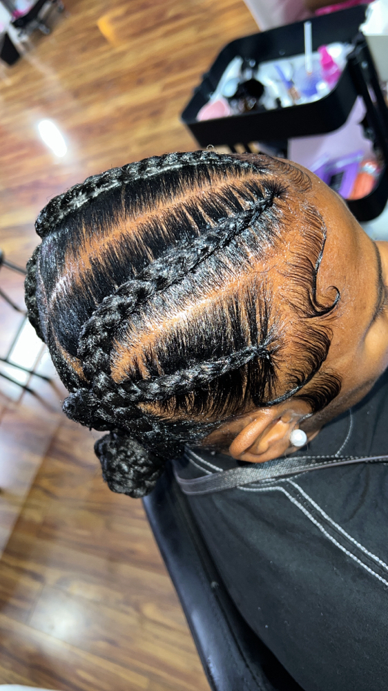 4 Cross Stitch Braids With Bun