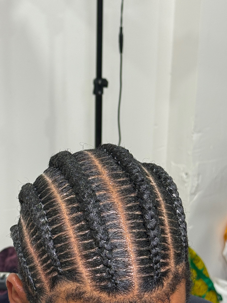 6 corn rows at Tea's Hair Styling Box in Brooklyn, NY