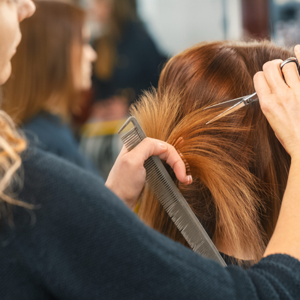 Woman Haircut at The Haven Beauty Co. in McDonough, GA