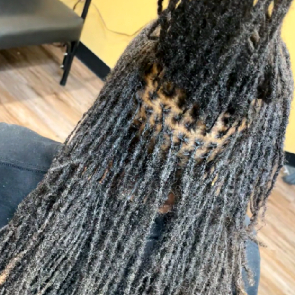 Micro Locs + Braids at Crowned By Trece in Houston, TX