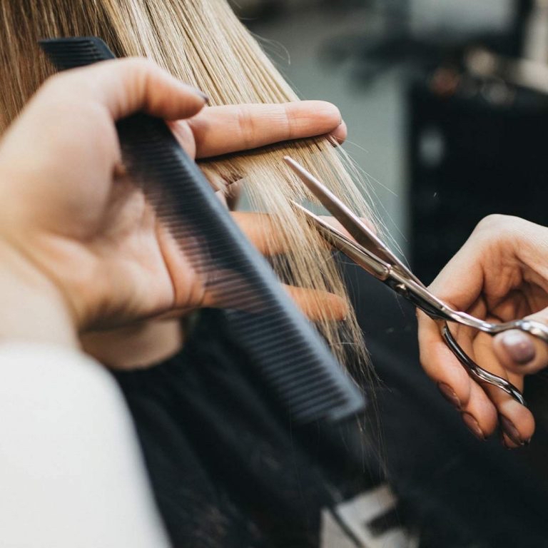 Woman’s Shampoo/cut, and style
