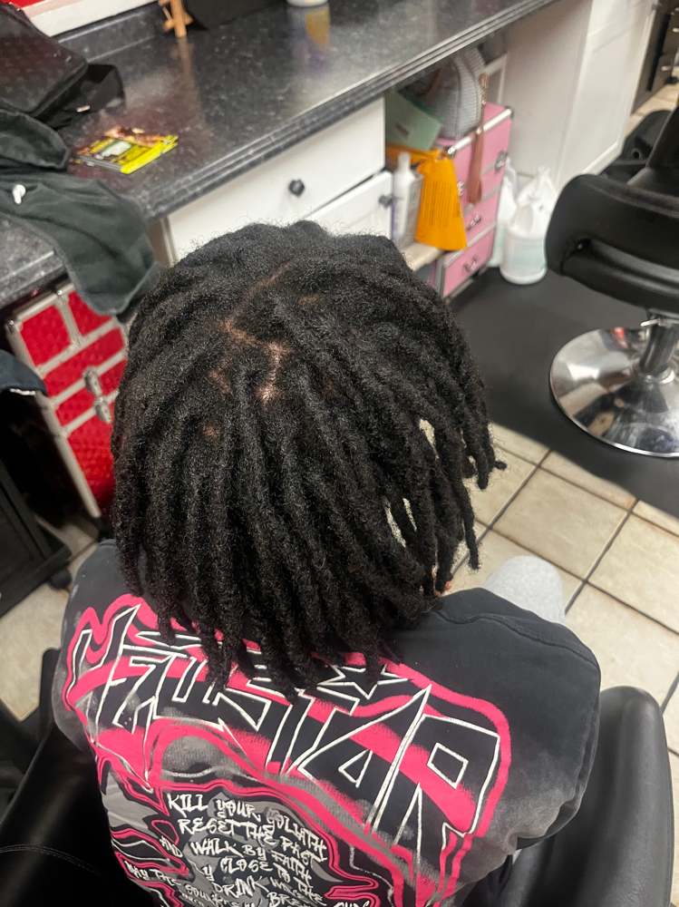 Re-Attaching Of Dreadlocks