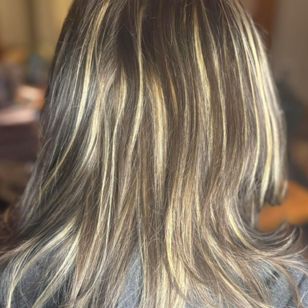 Lightening Service at Beauty by Uma in Silvis, IL