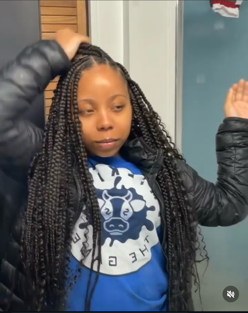 Smedium Boho Knotless Braids at Eryka’s Hair Couture in Midlothian, IL